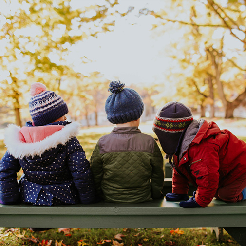 The Dewey School Kids On Bench